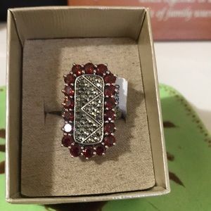 NEW in box sterling silver ring with garnet stones